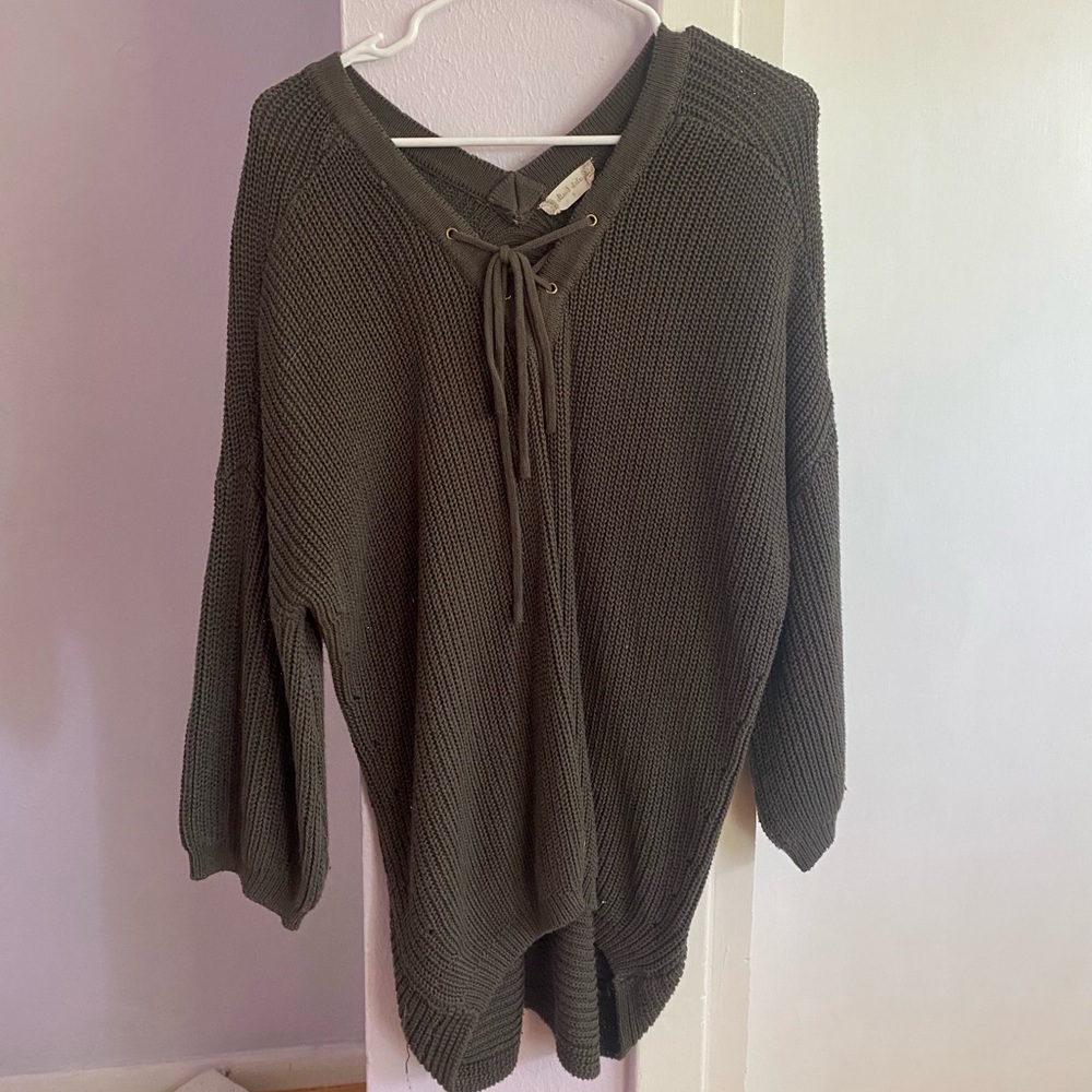 big sweater with lace up tie on the front